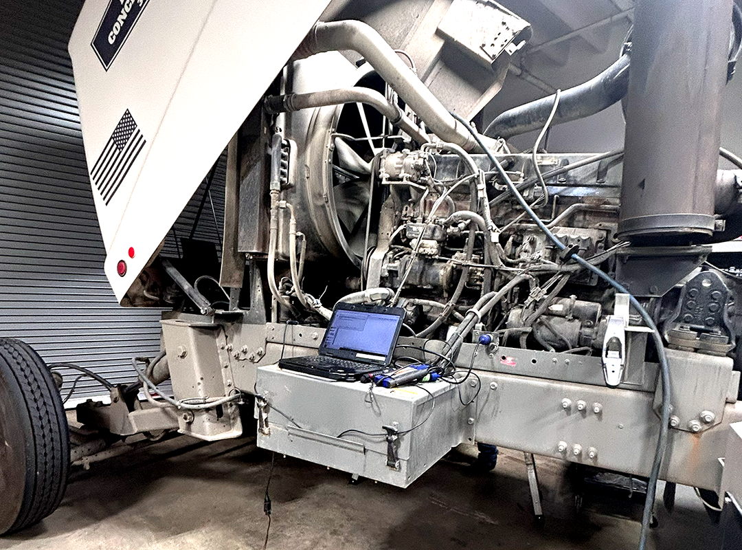 Gallaher technician running diagnostics on a heavy-duty truck